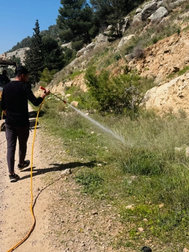 Ministry of Agriculture: The North Hebron Agriculture Directorate carries out spraying work on the sides of roads in forested areas to reduce the risk of fires